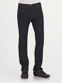 A straight, slightly slim fit in coveted raw denim that develops fades and a personalized fit over time. Five-pocket style Low rise Leather logo patch on back waist Inseam, about 34 Cotton Machine wash Made in USA A straight, slightly slim fit in coveted raw denim that develops fades and a personalized fit over time. Five-pocket style Low rise Leather logo patch on back waist Inseam, about 34 Cotton Machine wash Made in USA