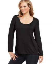 Button up your casual look with Calvin Klein's long sleeve plus size top-- it's a perfect match with jeans. Button up your casual look with Calvin Klein's long sleeve plus size top-- it's a perfect match with jeans.