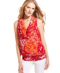 A bright print makes a bold summer statement on this MICHAEL Michael Kors cowl-neck tank -- perfect over the season's white denim! A bright print makes a bold summer statement on this MICHAEL Michael Kors cowl-neck tank -- perfect over the season's white denim!
