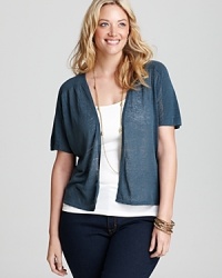 A minimalist approach to layering, this Jones New York Collection Plus cardigan tops off your daily look with a chic sheer silhouette. A minimalist approach to layering, this Jones New York Collection Plus cardigan tops off your daily look with a chic sheer silhouette.