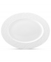 Set the tone with the white bone china of Devore dinnerware. A matte, organic texture lends chic distinction to an oval platter that's equally suited for fine dinner parties and every day of the week. From Donna Karan by Lenox.