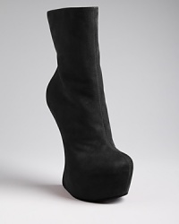 Museum quality, these Giuseppe Zanotti boots are a modern work of art, with a sculptural, gravity defying design. Museum quality, these Giuseppe Zanotti boots are a modern work of art, with a sculptural, gravity defying design.