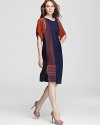 BCBGMAXAZRIA brings in the season with the color block Lia midi dress, rendered in rustic hues.