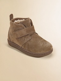 Comfort meets style in this ankle-high silhouette with sheepskin lining and a sturdy strap with grip-tape closure. Grip-tape closure Suede upper Rubber sole Padded insole Sheepskin lining Imported Comfort meets style in this ankle-high silhouette with sheepskin lining and a sturdy strap with grip-tape closure. Grip-tape closure Suede upper Rubber sole Padded insole Sheepskin lining Imported