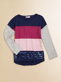 A bold colorblocked pattern adds in-the-now style to this hi-low-hemmed, long-sleeved top with sequin trim.CrewneckLong sleevesPullover styleHi-lo hem95% viscose/5% spandexHand washImported A bold colorblocked pattern adds in-the-now style to this hi-low-hemmed, long-sleeved top with sequin trim.CrewneckLong sleevesPullover styleHi-lo hem95% viscose/5% spandexHand washImported