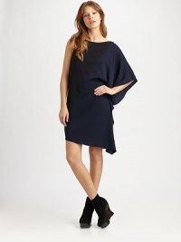 A lightweight swathe of colorblock silk, draped effortlessly from shoulder to hem.BoatneckDropped shoulderSingle open sleeveDraped at one sideAsymmetrical hemAbout 26 from natural waist93% silk/7% spandexDry cleanImportedModel shown is 5'8½ (174cm) wearing US size Small. A lightweight swathe of colorblock silk, draped effortlessly from shoulder to hem.BoatneckDropped shoulderSingle open sleeveDraped at one sideAsymmetrical hemAbout 26 from natural waist93% silk/7% spandexDry cleanImportedModel shown is 5'8½ (174cm) wearing US size Small.