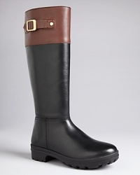In a fresh two-tone design, Hunter does leather--the Cirano boots boast timeless style with modern appeal. A rugged rubber sole lends practicality for slippery conditions. In a fresh two-tone design, Hunter does leather--the Cirano boots boast timeless style with modern appeal. A rugged rubber sole lends practicality for slippery conditions.