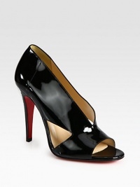 Sultry patent leather number with a peep toe and cut-out sides. Self-covered heel, 4 (100mm)Patent leather upperLeather liningSignature red leather solePadded insoleMade in ItalyOUR FIT MODEL RECOMMENDS ordering one size up as this style runs small. Sultry patent leather number with a peep toe and cut-out sides. Self-covered heel, 4 (100mm)Patent leather upperLeather liningSignature red leather solePadded insoleMade in ItalyOUR FIT MODEL RECOMMENDS ordering one size up as this style runs small.