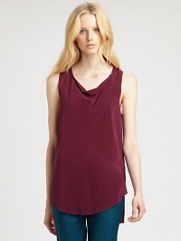 Light and airy, this silk basic is fashioned with a modern hi-lo hem and an unexpected cowlneck. CowlneckSleevelessContoured hi-lo hem hits below the hipsSilkDry cleanImportedModel shown is 5'10 (177cm) wearing US size 2. Light and airy, this silk basic is fashioned with a modern hi-lo hem and an unexpected cowlneck. CowlneckSleevelessContoured hi-lo hem hits below the hipsSilkDry cleanImportedModel shown is 5'10 (177cm) wearing US size 2.
