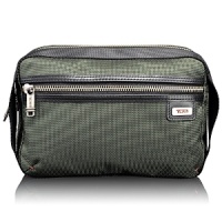 Neat and versatile, this full-featured travel kit has a casual look. Designed to sit on the counter or hang from a fixture, it features zip and open pockets inside and out, elastic loops to keep things organized and anti-bacterial lining. Neat and versatile, this full-featured travel kit has a casual look. Designed to sit on the counter or hang from a fixture, it features zip and open pockets inside and out, elastic loops to keep things organized and anti-bacterial lining.