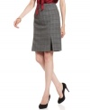 Nine West adds a twist to a fall staple piece -- this plaid straight skirt features subtle, contrasting inverted pleats at the hem.