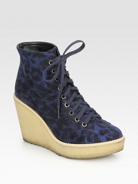 A bold exotic print adds signature style to this go-to wedge silhouette of faux suede. Rubber wedge, 3¾ (95mm)Rubber platform, 1 (25mm)Compares to a 2¾ heel (70mm)Faux suede upperFaux leather liningRubber solePadded insoleImported A bold exotic print adds signature style to this go-to wedge silhouette of faux suede. Rubber wedge, 3¾ (95mm)Rubber platform, 1 (25mm)Compares to a 2¾ heel (70mm)Faux suede upperFaux leather liningRubber solePadded insoleImported