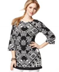 An alluring scarf-style print updates Style&co.'s classic three quarter sleeve jersey tunic. Add pop with colorful bangles or sparkling earrings! (Clearance) An alluring scarf-style print updates Style&co.'s classic three quarter sleeve jersey tunic. Add pop with colorful bangles or sparkling earrings! (Clearance)