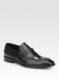 Handsome slip-on loafer style rendered in luxurious leather, with metal bit detail.Leather upperLeather liningPadded insoleLeather soleImported Handsome slip-on loafer style rendered in luxurious leather, with metal bit detail.Leather upperLeather liningPadded insoleLeather soleImported