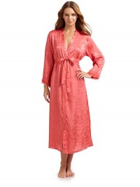 THE LOOKV-neckOpen front with interior and exterior tiesLong sleeves with tulle rufflesEtched rose print designSide slash pocketsBack tulle ruffle detailsTHE FITAbout 52 from shoulder to hemTHE MATERIALPolyesterCARE & ORIGINMachine washImported THE LOOKV-neckOpen front with interior and exterior tiesLong sleeves with tulle rufflesEtched rose print designSide slash pocketsBack tulle ruffle detailsTHE FITAbout 52 from shoulder to hemTHE MATERIALPolyesterCARE & ORIGINMachine washImported