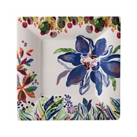 An opulent blue flower blooms from a backdrop of garden delights on the fresh, fun Eden candy plate from Gien France. An opulent blue flower blooms from a backdrop of garden delights on the fresh, fun Eden candy plate from Gien France.
