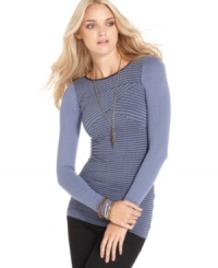 A body-con ribbed knit makes this Free People tunic a hot pick for a casual fall look! A body-con ribbed knit makes this Free People tunic a hot pick for a casual fall look!