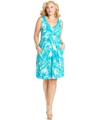A knotted front lends a lovely accent to Style&co.'s sleeveless plus size dress-- wear it from desk to dinner! A knotted front lends a lovely accent to Style&co.'s sleeveless plus size dress-- wear it from desk to dinner!