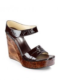 THE LOOKPatent leather top strapPatent leather collarCork and wooden wedge, 5 (125mm)Cork platform, 1½ (40mm)Compares to a 3½ heel (90mm)THE MATERIALPatent leather upperLeather lining and soleORIGINMade in Italy