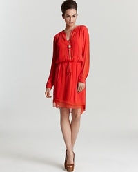 This hot orange DIANE von FURSTENBERG crepe dress exudes easy elegance--think chic pleats through the silhouette and sheer trim at the layered, high/low hem. Coupled with a cinch waist featuring a drawstring tie adorned with silver hardware, this silhouette is summer's must-have. This hot orange DIANE von FURSTENBERG crepe dress exudes easy elegance--think chic pleats through the silhouette and sheer trim at the layered, high/low hem. Coupled with a cinch waist featuring a drawstring tie adorned with silver hardware, this silhouette is summer's must-have.