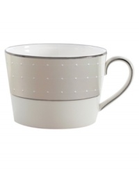 Elegant and modern, this fine china teacup adds subtle definition to the rest of the Étoile Platinum collection. From innovative designer Monique Lhullier, it features a pearlescent border with glossy raised dots and a fine stitch-like pattern. Elegant and modern, this fine china teacup adds subtle definition to the rest of the Étoile Platinum collection. From innovative designer Monique Lhullier, it features a pearlescent border with glossy raised dots and a fine stitch-like pattern.