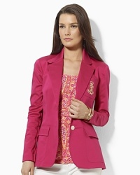 Lauren Ralph Lauren tailored the Georgina jacket in sleek stretch cotton twill with a signature embroidered crest for a preppy look. Lauren Ralph Lauren tailored the Georgina jacket in sleek stretch cotton twill with a signature embroidered crest for a preppy look.
