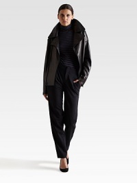 The distinctive motorcycle silhouette, slightly oversized and crafted from sleek bonded leather.Oversized notch collarDropped collarAsymmetric front zipperZip cuffsAbout 23 from shoulder to hemLeatherBonding: woolDry clean by a leather specialistMade in ItalyModel shown is 5'10 (177cm) wearing US size Small. The distinctive motorcycle silhouette, slightly oversized and crafted from sleek bonded leather.Oversized notch collarDropped collarAsymmetric front zipperZip cuffsAbout 23 from shoulder to hemLeatherBonding: woolDry clean by a leather specialistMade in ItalyModel shown is 5'10 (177cm) wearing US size Small.
