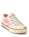 Juicy Juicy Juicy says it all with these playful, printed canvas shoes featuring elastic laces and rubber cap toes.