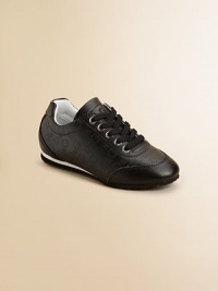 A sleek leather style, subtly patterned with perforated D&G initials.Leather upperLace-up frontPadded collarPolyester liningNon-slip sneaker soleImported A sleek leather style, subtly patterned with perforated D&G initials.Leather upperLace-up frontPadded collarPolyester liningNon-slip sneaker soleImported
