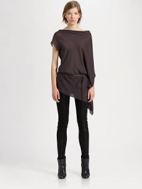 Finished with a detachable leather belt, this semi-sheer boatneck has a single cape sleeve, single short sleeve and an asymmetrical hem. BoatneckSingle short sleeveSingle cape sleeveDetachable leather beltAsymmetrical hemViscoseDry cleanImported of Italian fabricModel shown is 5'10 (177cm) wearing US size Small.OUR FIT MODEL RECOMMENDS ordering true size. Finished with a detachable leather belt, this semi-sheer boatneck has a single cape sleeve, single short sleeve and an asymmetrical hem. BoatneckSingle short sleeveSingle cape sleeveDetachable leather beltAsymmetrical hemViscoseDry cleanImported of Italian fabricModel shown is 5'10 (177cm) wearing US size Small.OUR FIT MODEL RECOMMENDS ordering true size.