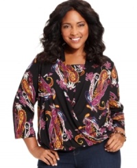 Add pizazz to your neutral bottoms with Elementz' printed plus size top, defined by a faux wrap design. Add pizazz to your neutral bottoms with Elementz' printed plus size top, defined by a faux wrap design.