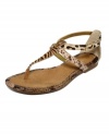 Rock out in this exotic style all season long. Sperry Top-Sider's Summerlin flat sandals feature an all-over animal print with a designer logo at the vamp.