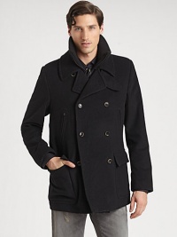 A key wardrobe essential to keep you both stylish and warm this winter, handsomely crafted in Italy of a luxurious wool, nylon and cashmere blend with an interior, removable gilet vest.Button-frontZippered chest, waist flap pocketsAbout 30 from shoulder to hem70% wool/20% nylon/10% cashmereDry cleanMade in Italy A key wardrobe essential to keep you both stylish and warm this winter, handsomely crafted in Italy of a luxurious wool, nylon and cashmere blend with an interior, removable gilet vest.Button-frontZippered chest, waist flap pocketsAbout 30 from shoulder to hem70% wool/20% nylon/10% cashmereDry cleanMade in Italy