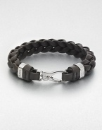 A handsomely braided leather bracelet in a solid hue, perfect for layered styling.LeatherAbout 3 diam.Spring claspMade in Italy
