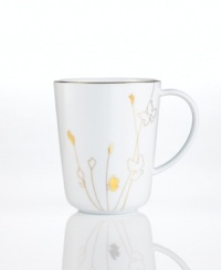 Wildflowers gleam in polished gold, adding whimsical glow to this Grand Buffet Silhouette mug. A banded edge adds a classic touch to a pattern with modern spirit. Wildflowers gleam in polished gold, adding whimsical glow to this Grand Buffet Silhouette mug. A banded edge adds a classic touch to a pattern with modern spirit.