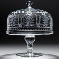 This is a practical and wonderfully decorative covered cake stand and dome. Perfect for displaying the finest gateaux. Exquisitely hand engraved, it is the fanciest piece of fine crystal. This is a practical and wonderfully decorative covered cake stand and dome. Perfect for displaying the finest gateaux. Exquisitely hand engraved, it is the fanciest piece of fine crystal.