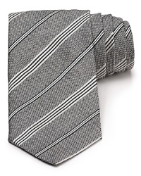 Whether you're speaking at the conference or giving a toast for a friend, this stately tie from Armani Collezioni gives your words an added authority. Whether you're speaking at the conference or giving a toast for a friend, this stately tie from Armani Collezioni gives your words an added authority.