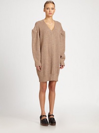 This oversized knit silhouette is shot through with shimmering threads.V necklineDropped shoulderLong puffed sleevesRib-knit cuffs and hemAbout 19 from natural waistAlpacaDry cleanMade in Italy of imported fabricModel shown is 5'8 (172cm) wearing US size 4. This oversized knit silhouette is shot through with shimmering threads.V necklineDropped shoulderLong puffed sleevesRib-knit cuffs and hemAbout 19 from natural waistAlpacaDry cleanMade in Italy of imported fabricModel shown is 5'8 (172cm) wearing US size 4.