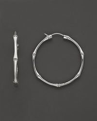 Sterling silver bamboo-inspired earrings by Gucci. Sterling silver bamboo-inspired earrings by Gucci.
