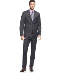 Mix it up. In a sleek charcoal with fine purple lines, this slim-fit suit from Tallia is your most modern look.