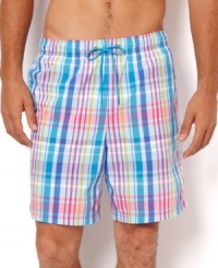 Get preppy by the pool in these stylish plaid print swim trunks by Nautica. Get preppy by the pool in these stylish plaid print swim trunks by Nautica.
