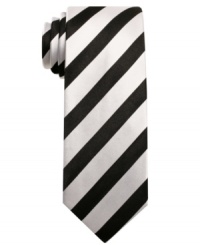 Stand out in the big bold stripes of this sleek, skinny tie from Alfani RED. Stand out in the big bold stripes of this sleek, skinny tie from Alfani RED.