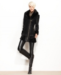 GUESS' faux shearling coat gives you the luxury of the real thing with a price tag that's easy on your wallet. GUESS' faux shearling coat gives you the luxury of the real thing with a price tag that's easy on your wallet.