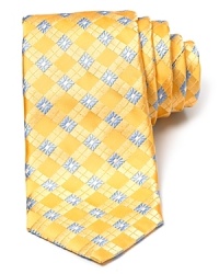A squared floral print makes a statement on a silk tie from Ike Behar. A squared floral print makes a statement on a silk tie from Ike Behar.