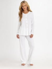 Luxurious versatility in a classic silhouette created from long-staple Egyptian Giza cotton, mercerized for ultra softness and a natural sheen.Round necklineButton frontSlightly flared topPull-on pantsMercerized Egyptian Giza cotton interlockMachine washImportedAdditional Information Women's Modern Size Guide Luxurious versatility in a classic silhouette created from long-staple Egyptian Giza cotton, mercerized for ultra softness and a natural sheen.Round necklineButton frontSlightly flared topPull-on pantsMercerized Egyptian Giza cotton interlockMachine washImportedAdditional Information Women's Modern Size Guide