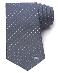 Burberry London contributes this superior silk tie for your polished wardrobe, festooned with a classic pattern of dots for traditional appeal. Burberry London contributes this superior silk tie for your polished wardrobe, festooned with a classic pattern of dots for traditional appeal.