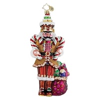 A nutcracker toting sweets and treats decorates your holiday tree. A nutcracker toting sweets and treats decorates your holiday tree.