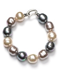 Majorica's multi-colored pearl bracelet turns the look of your basic black dress into something really special. Majorica's multi-colored pearl bracelet turns the look of your basic black dress into something really special.
