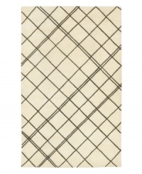 Strike a new chord in your decor. Hand-tufted to produce an incredibly soft hand, this all-wool rug makes a stylish, symmetrical mark, no matter what the surroundings. Strike a new chord in your decor. Hand-tufted to produce an incredibly soft hand, this all-wool rug makes a stylish, symmetrical mark, no matter what the surroundings.