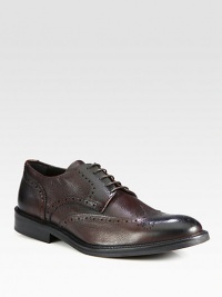 Traditional wingtip oxford style crafted in Italy from textured leather.Leather upperLeather liningPadded insoleRubber soleMade in Italy Traditional wingtip oxford style crafted in Italy from textured leather.Leather upperLeather liningPadded insoleRubber soleMade in Italy